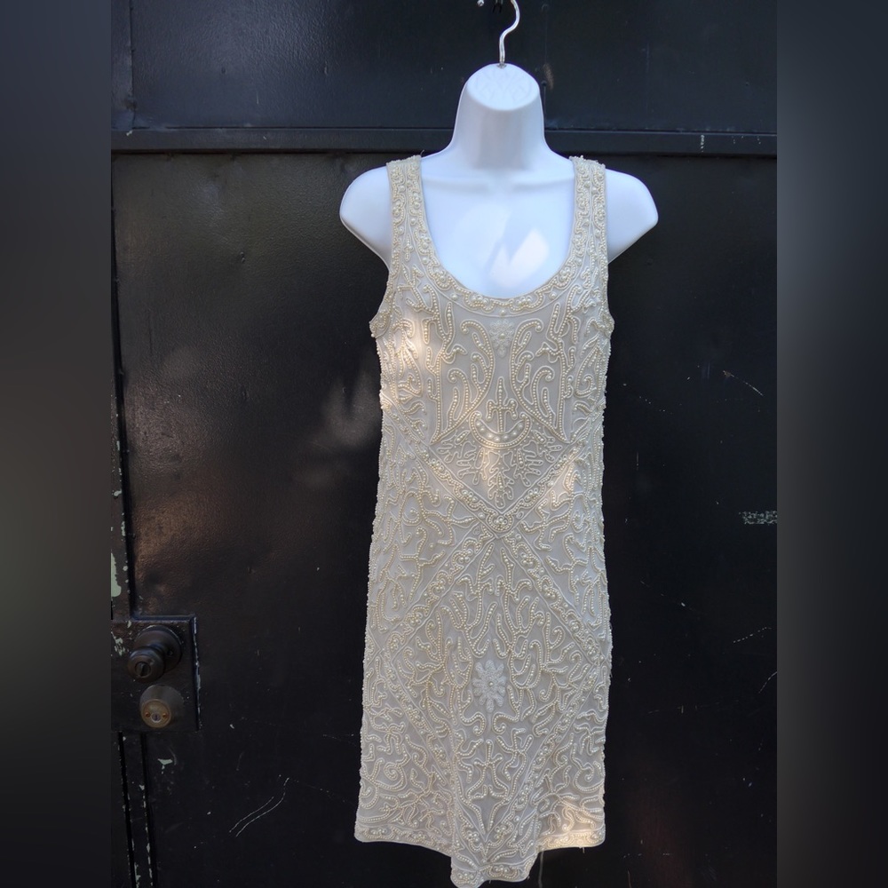 Beautifully beaded from London designer, perfect condition, cream & Silk.